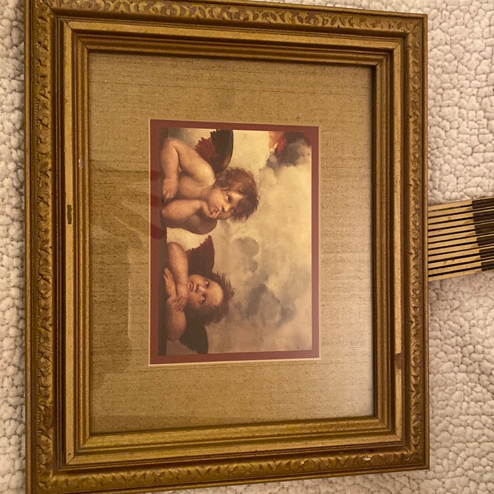 Angels with maroon matting and gold frame. 12.5” x 10.5.